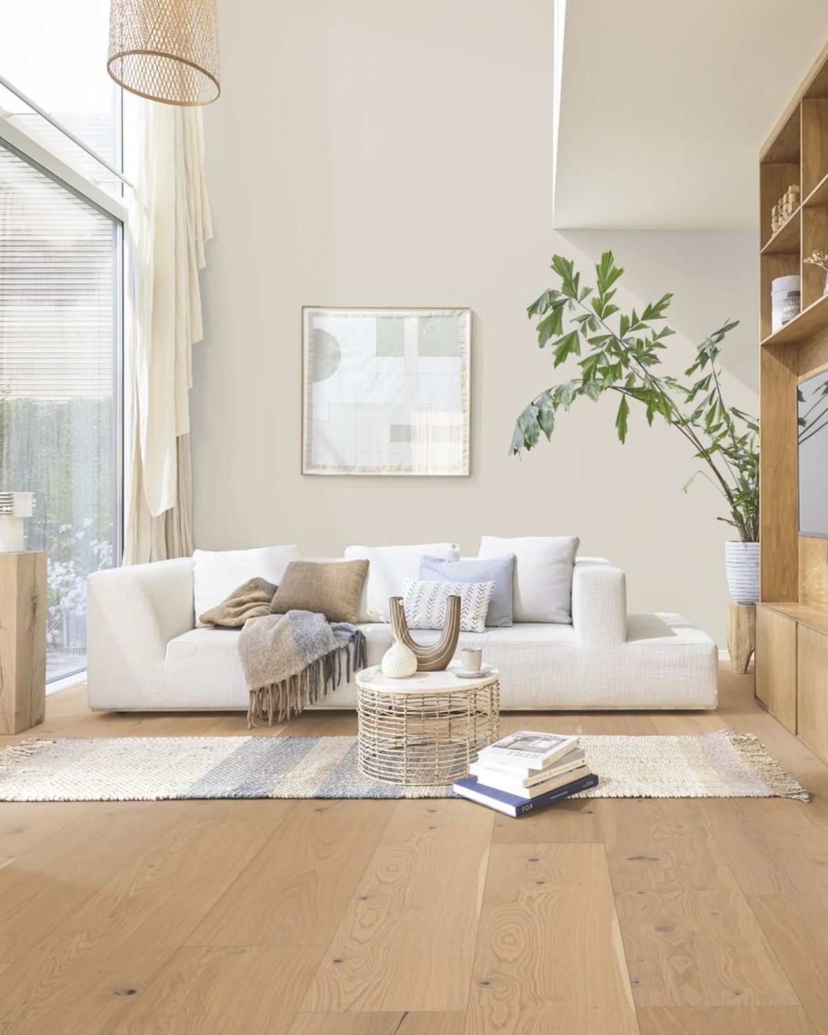 Flyt natural oak wide plank in a pale living room