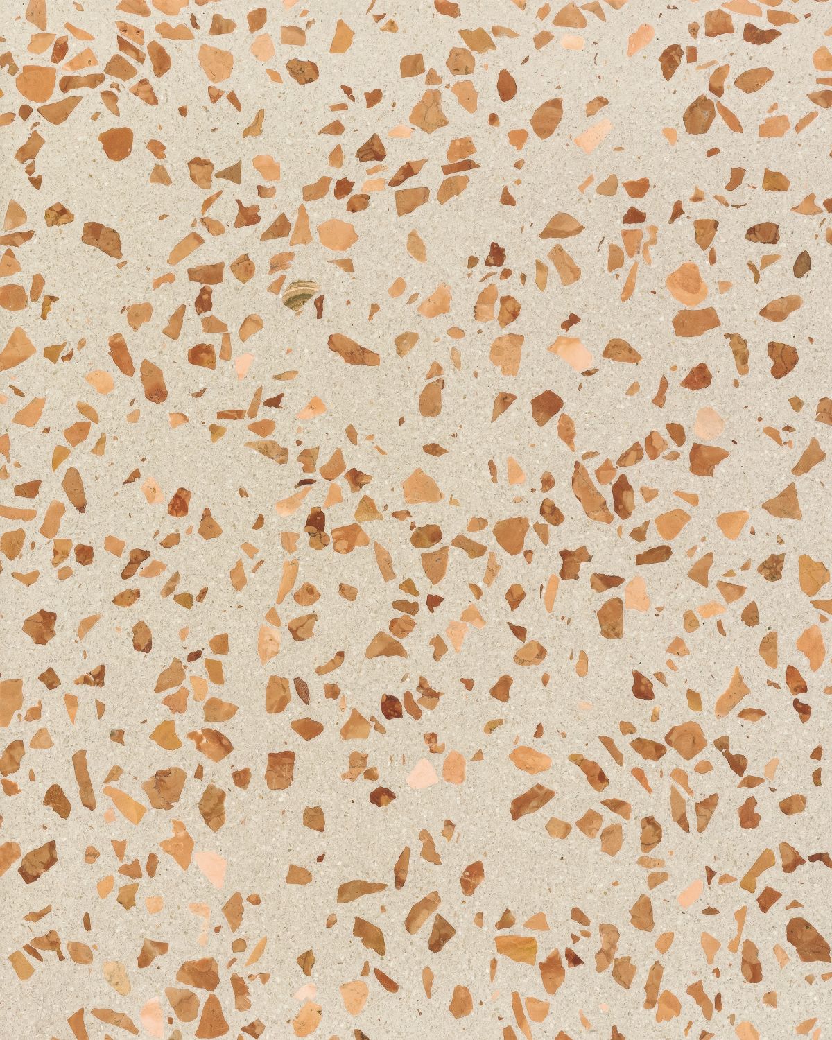Terrazzo pattern with brown and beige stones on a beige background